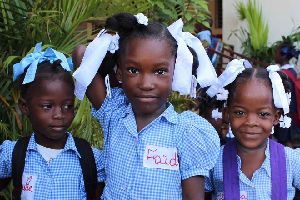Three Primary School Girls Smiling