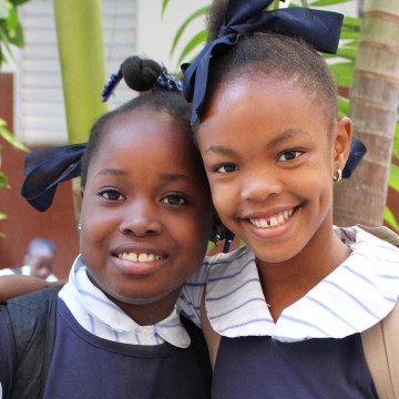 Two Primary School Girls Smiling